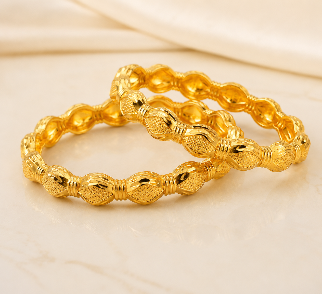 Segmented Gold Bangles